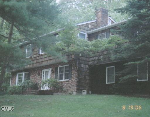 15 Deer Run Road Brookfield, CT 06804 - Photo 1 of 1 front view of a house with a yard