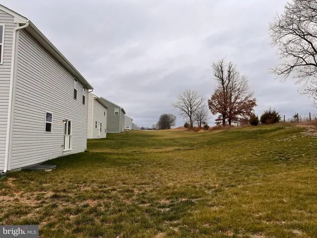 a view of yard covered with snow