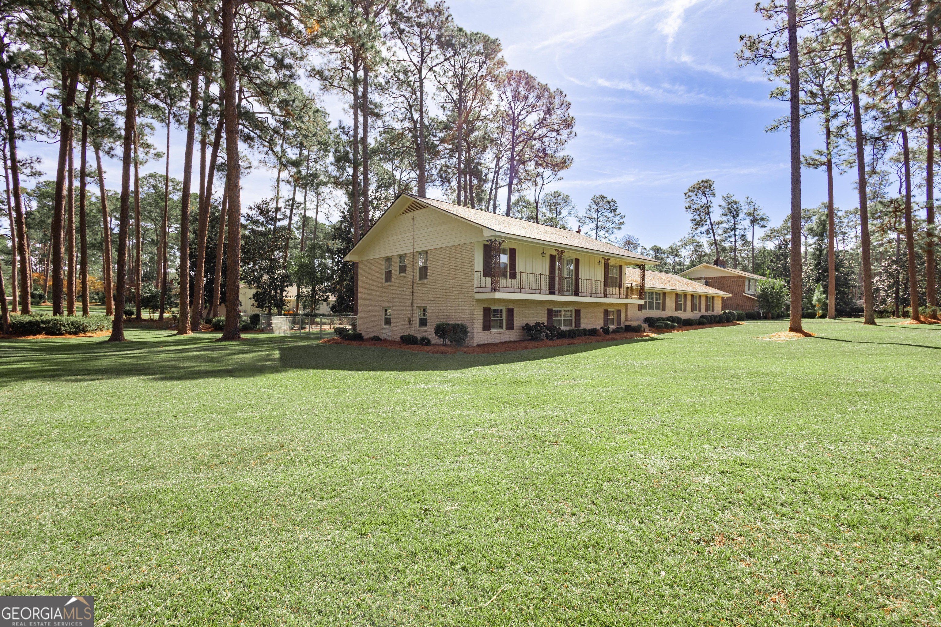 2021 Emory Drive Tifton, GA 31794 - Photo 2 of 43 a view of a house with a big yard