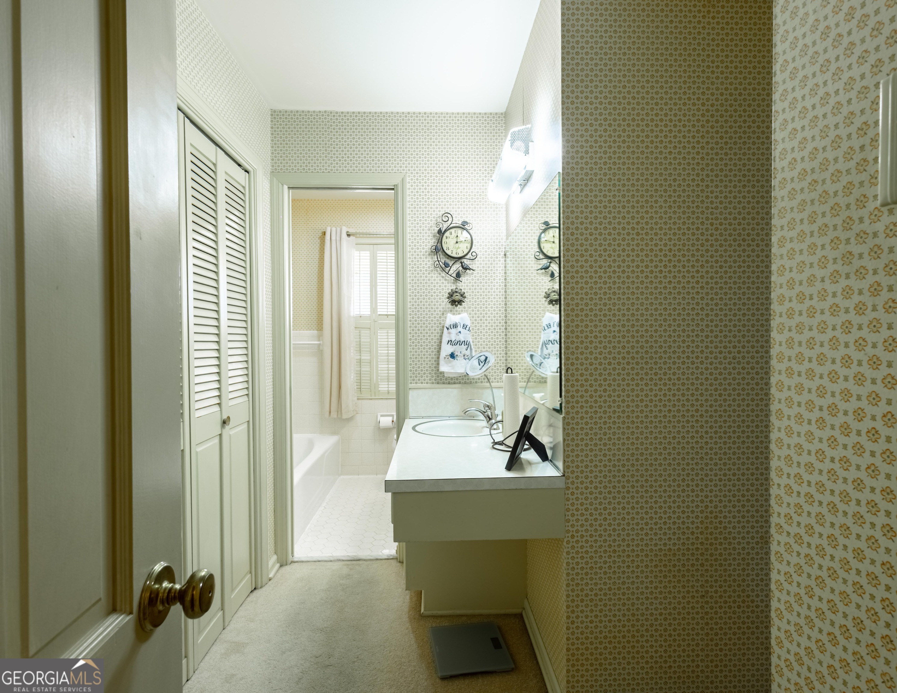 2021 Emory Drive Tifton, GA 31794 - Photo 22 of 43 a bathroom with a sink a toilet and shower
