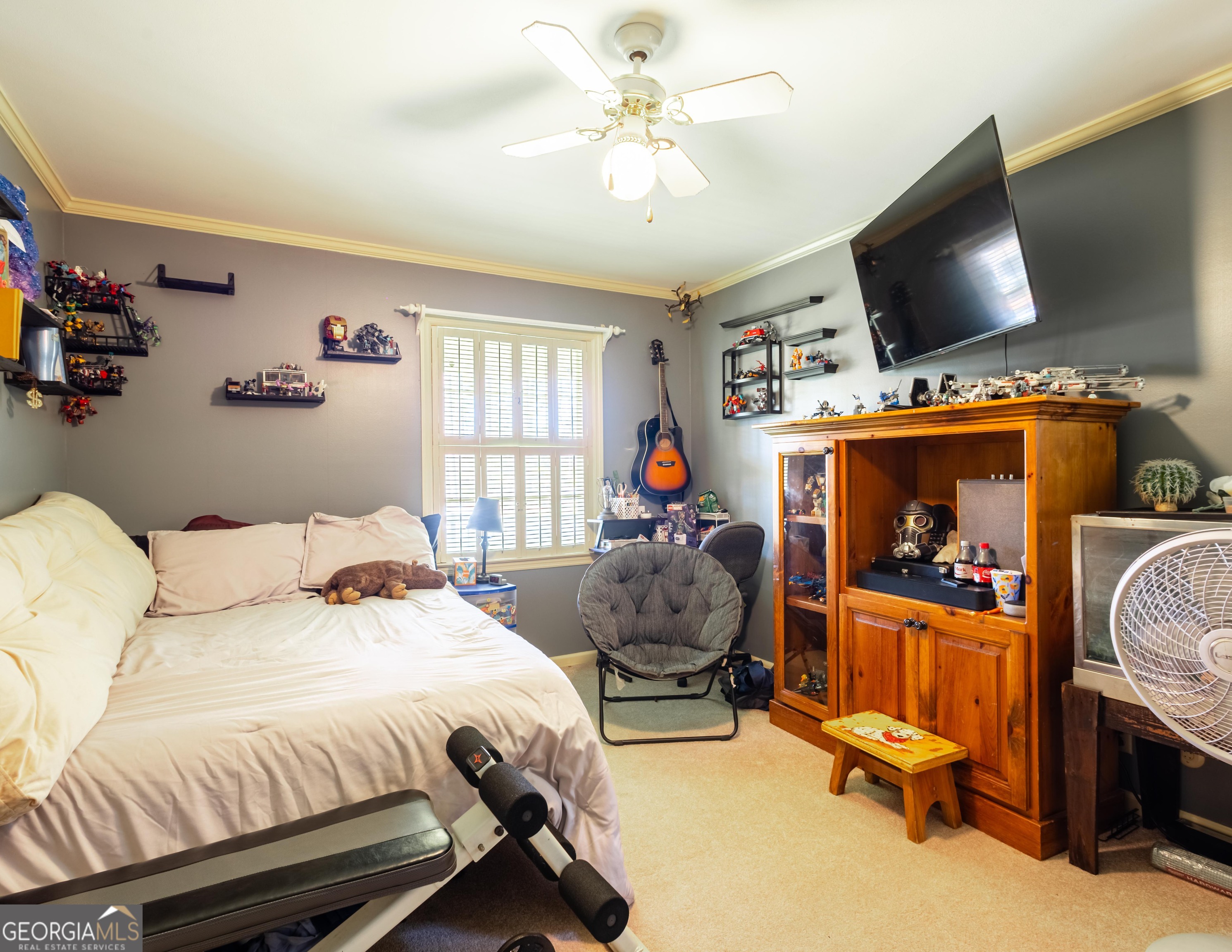 2021 Emory Drive Tifton, GA 31794 - Photo 29 of 43 a bedroom with a bed and a flat screen tv