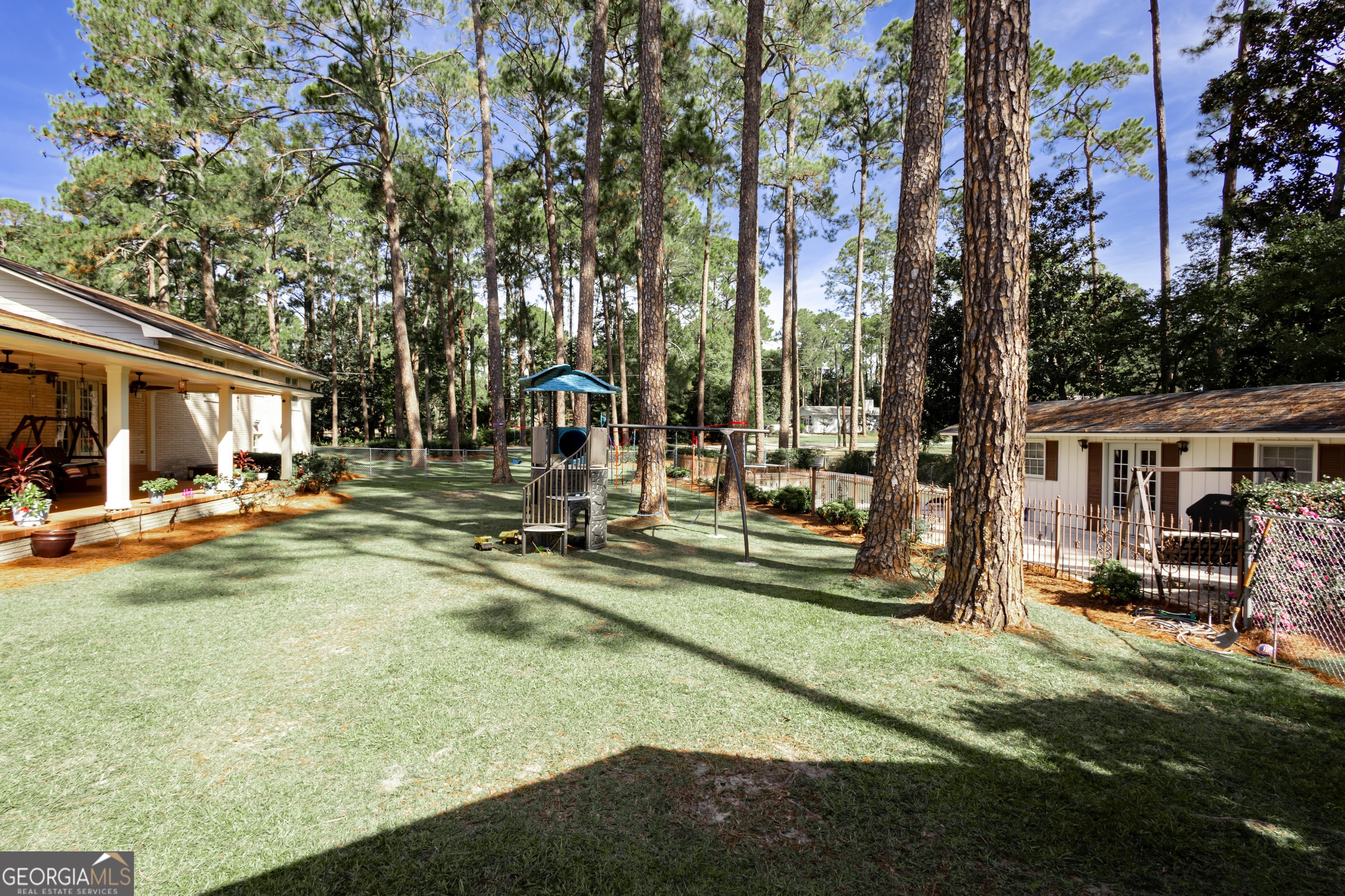 2021 Emory Drive Tifton, GA 31794 - Photo 9 of 43 a view of a house with swimming pool and sitting area
