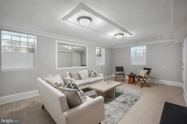 a room with a table and chairs