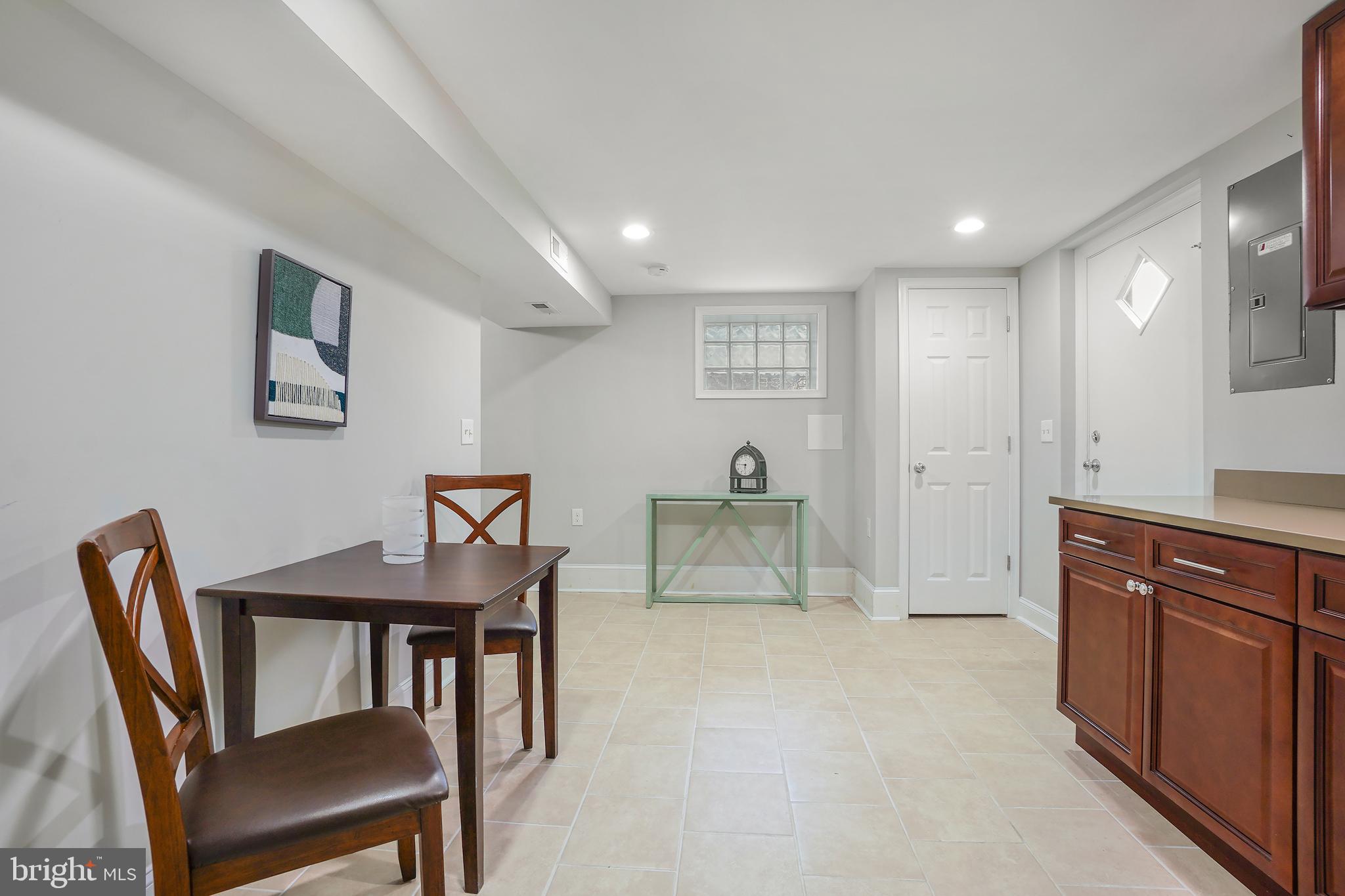 514 Silver Spring Avenue Silver Spring, MD 20910 - Photo 25 of 32 a view of a dining room with furniture