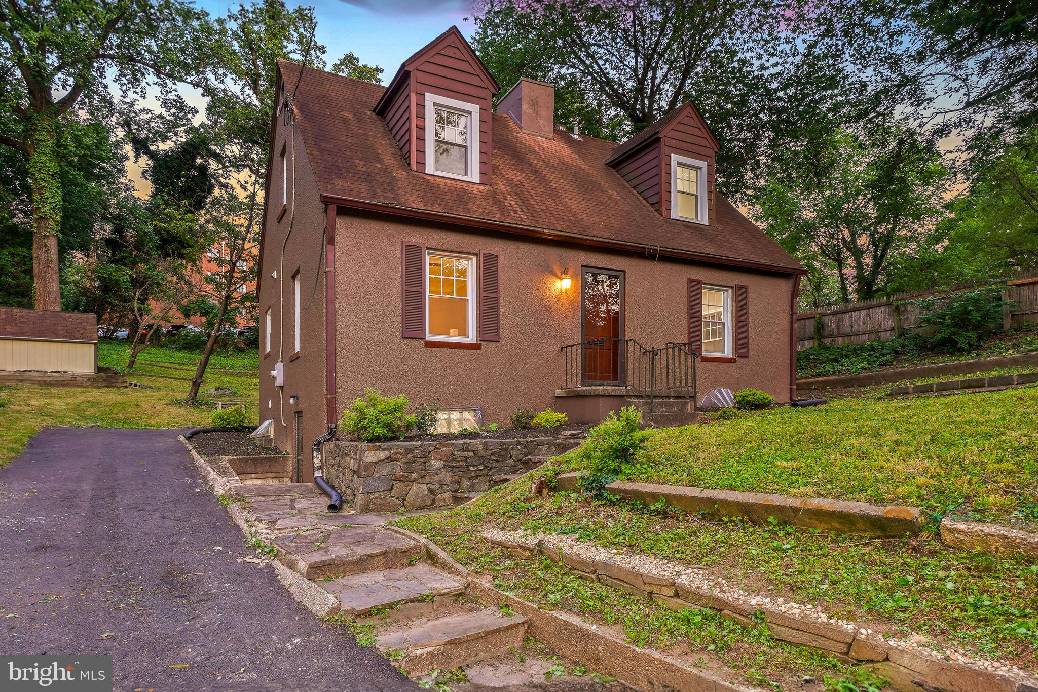 514 Silver Spring Avenue Silver Spring, MD 20910 - Photo 29 of 32 a front view of a house with garden