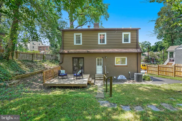 a view of a park that has large trees