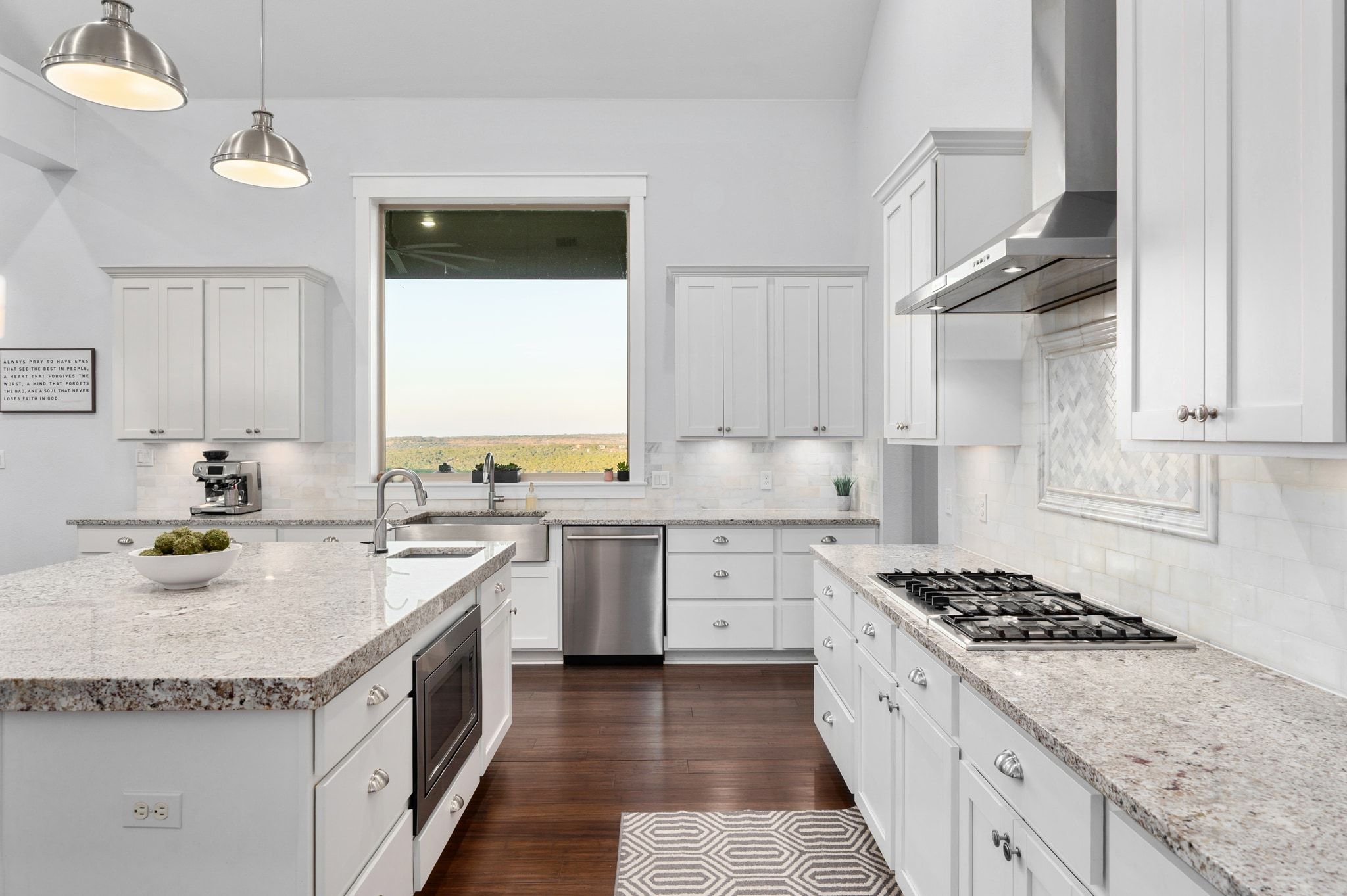 1821 Overland Stage Road Dripping Springs, TX 78620 - Photo 4 of 39 a kitchen with granite countertop a sink stove and cabinets