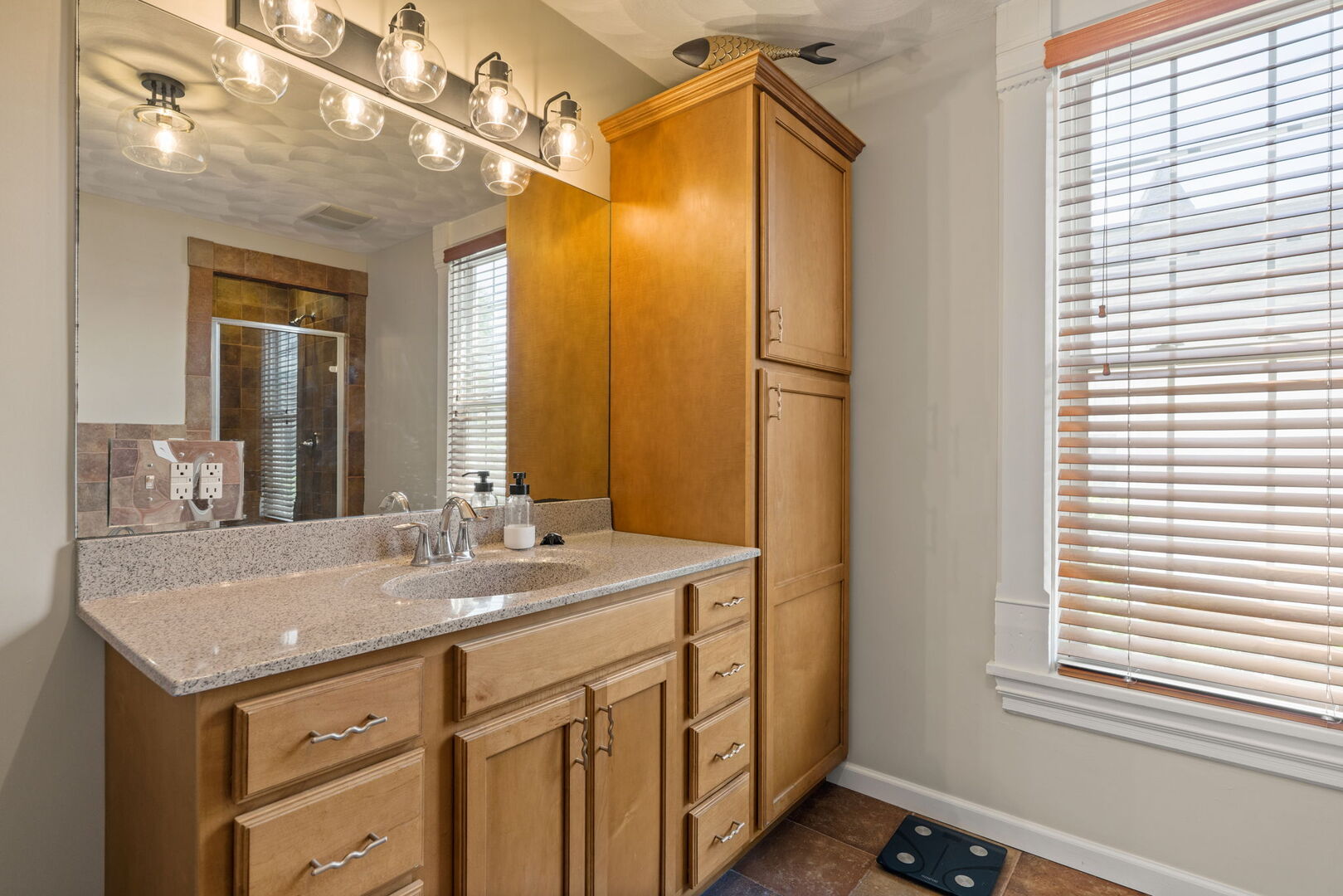 417 North State Street Geneseo, IL 61254 - Photo 18 of 51 a bathroom with a sink and a mirror