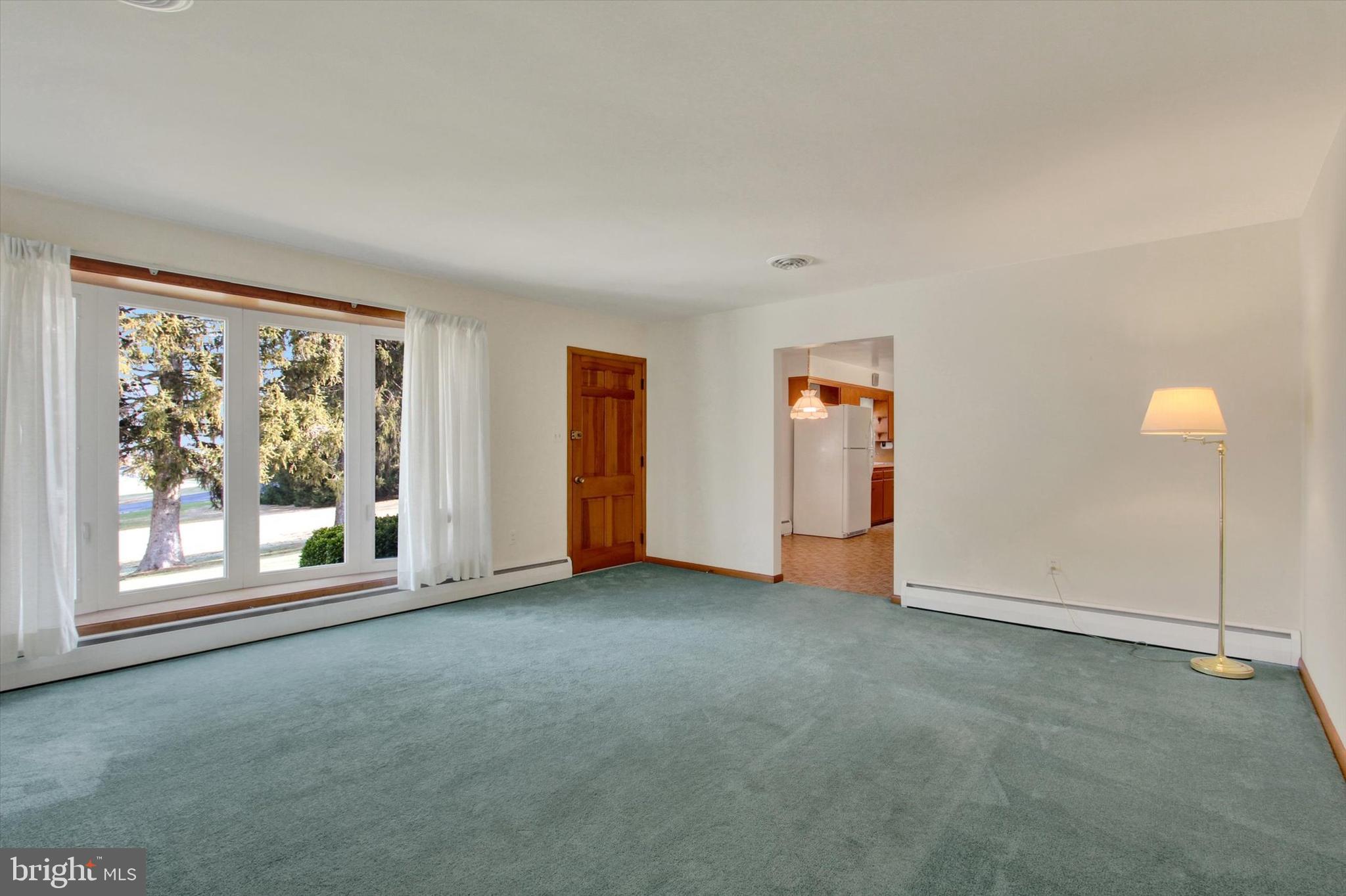 3400 Hanover Pike Manchester, MD 21102 - Photo 5 of 29 Living Room w/HW underneath carpet