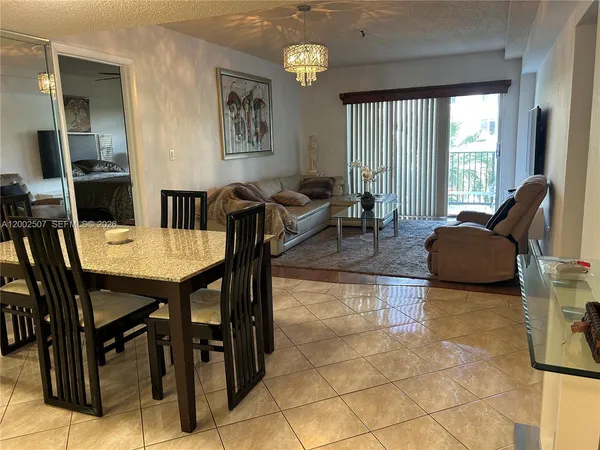 a view of a livingroom and dining room