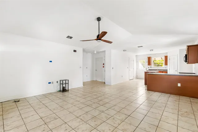 a view of an empty room and window