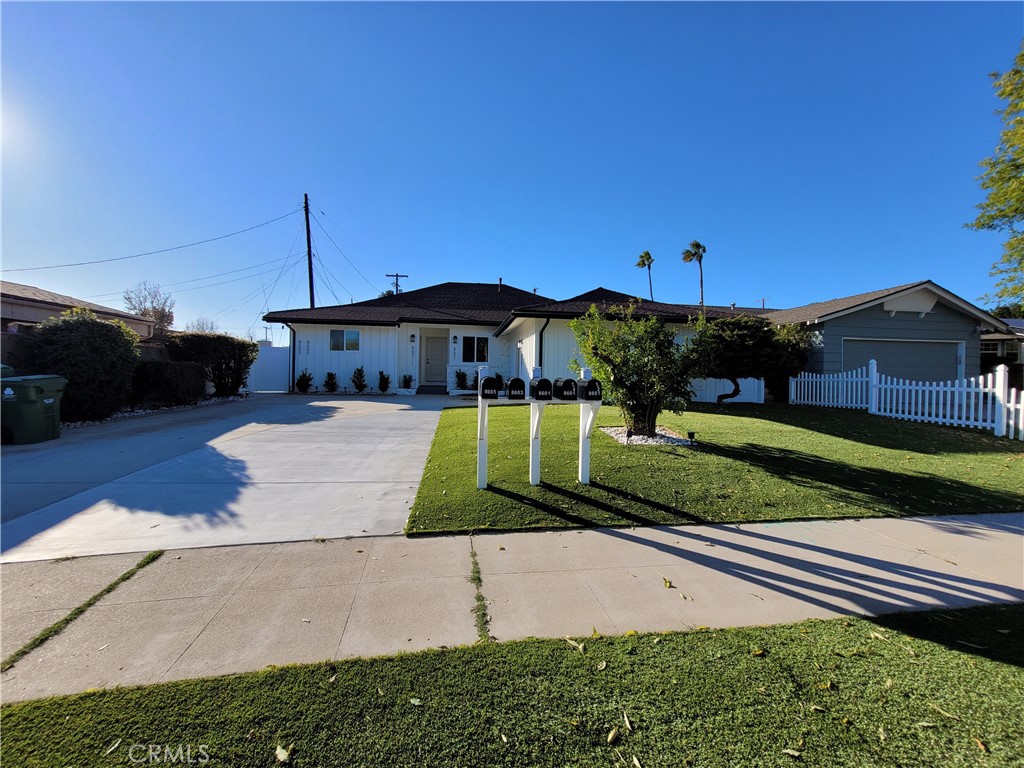 8601 Delco Avenue, Unit 1/4 Winnetka, CA 91306 - Photo 2 of 25 a view of a house with a yard porch and sitting area