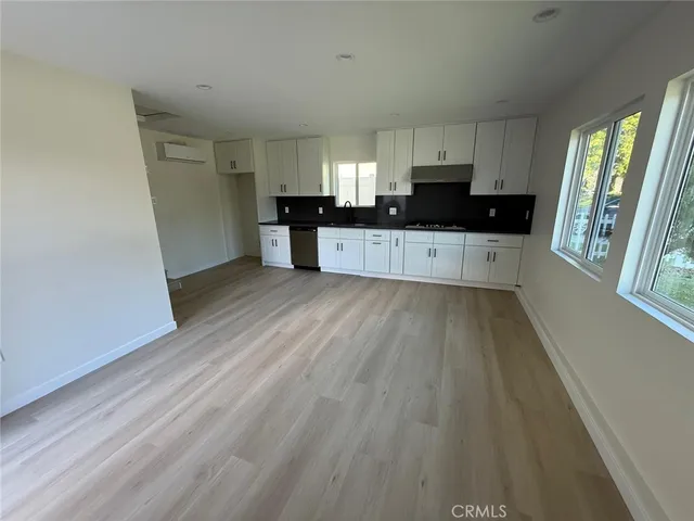 a view of a utility room with a sink
