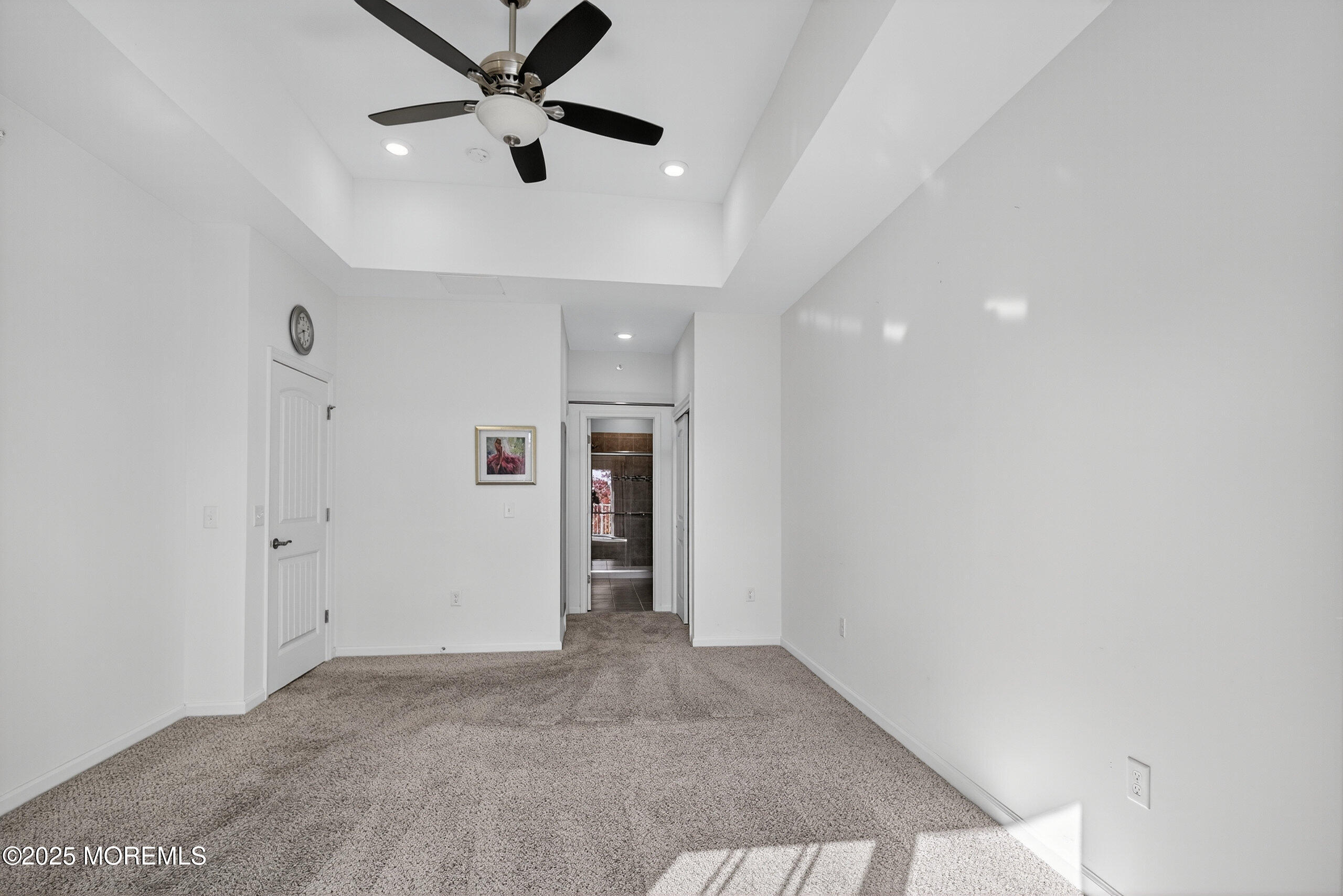 67 Grabowski Drive, Unit 321 Parlin, NJ 08859 - Photo 14 of 38 a view of an empty room and a ceiling fan