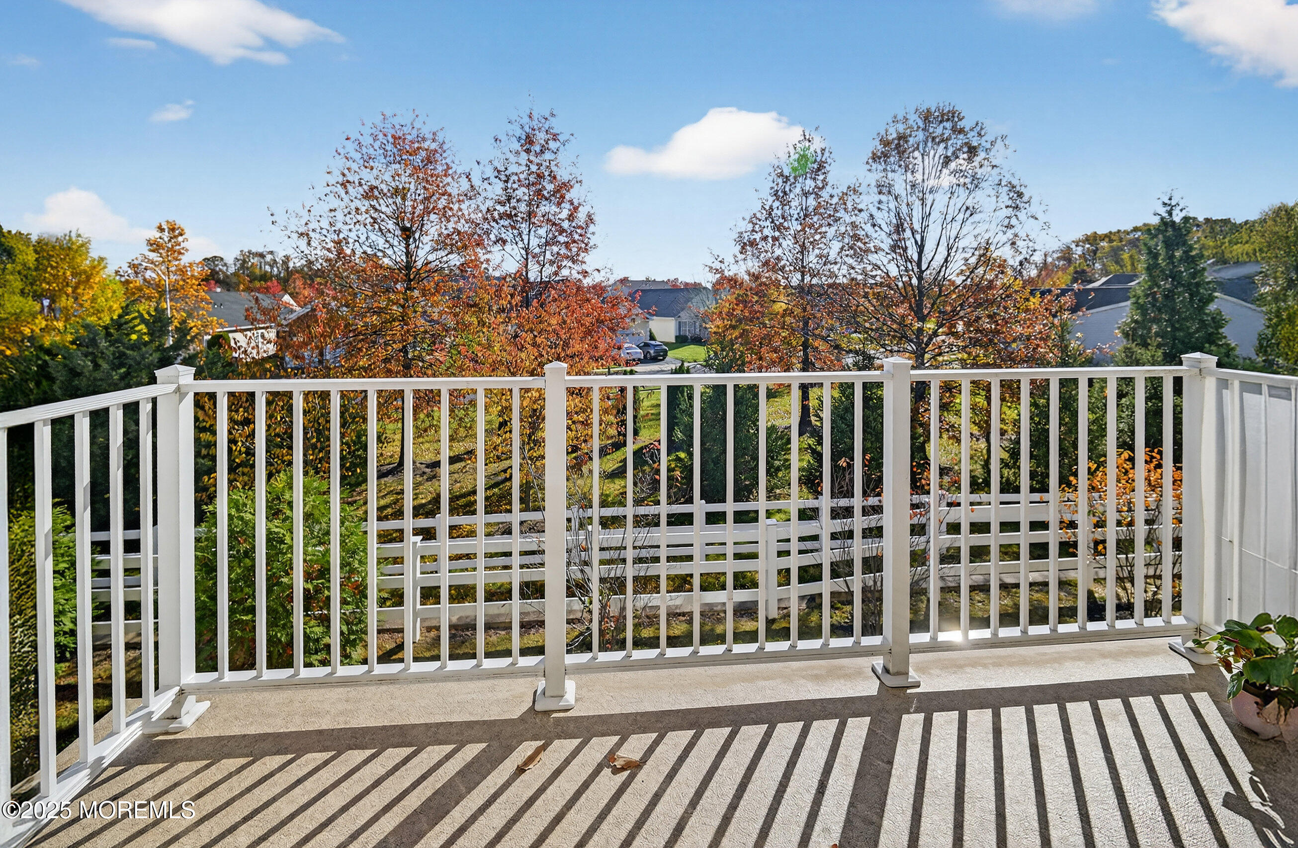 67 Grabowski Drive, Unit 321 Parlin, NJ 08859 - Photo 16 of 38 a view of a balcony with wooden floor