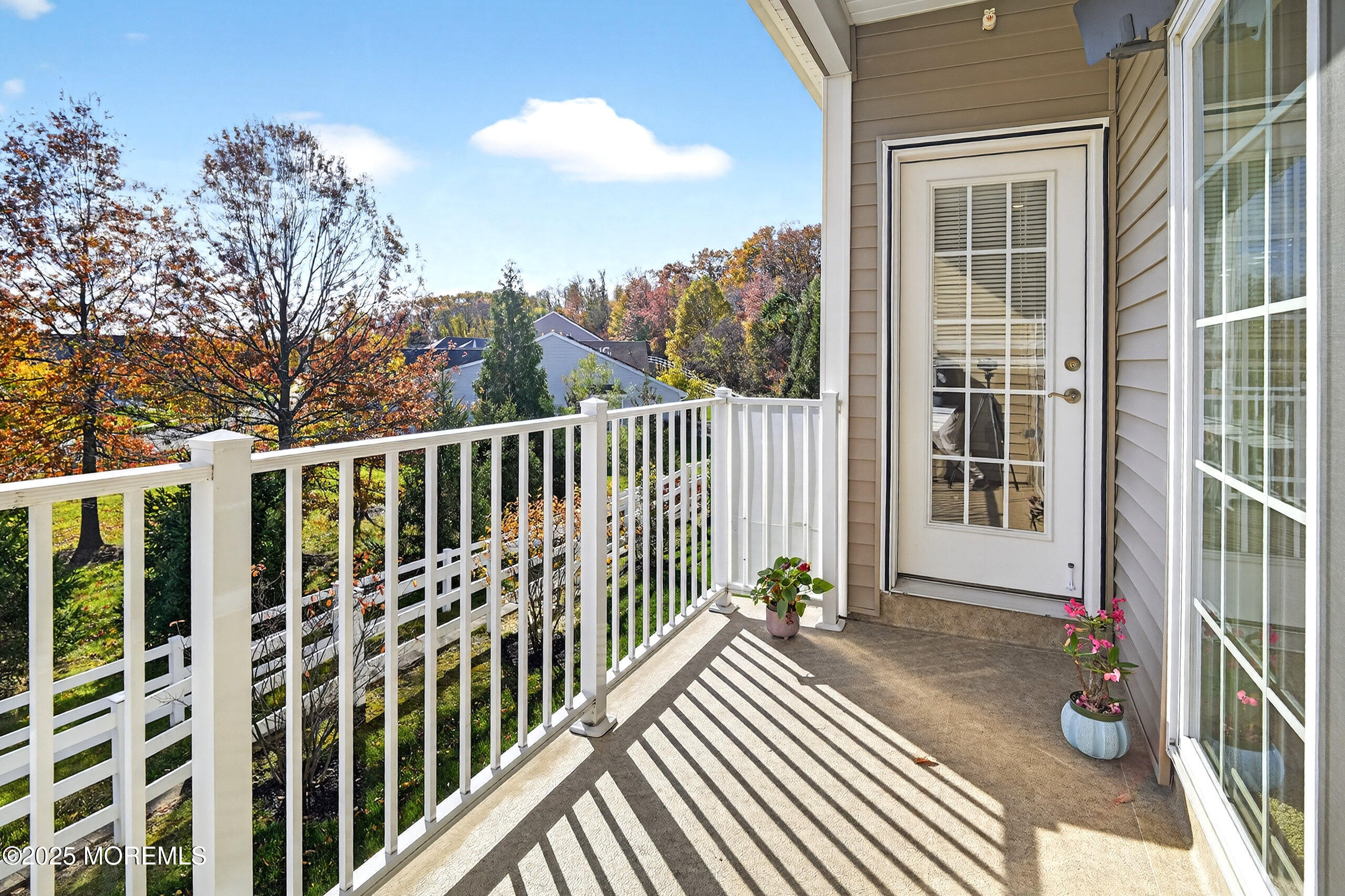 67 Grabowski Drive, Unit 321 Parlin, NJ 08859 - Photo 20 of 38 a view of a balcony with wooden floor