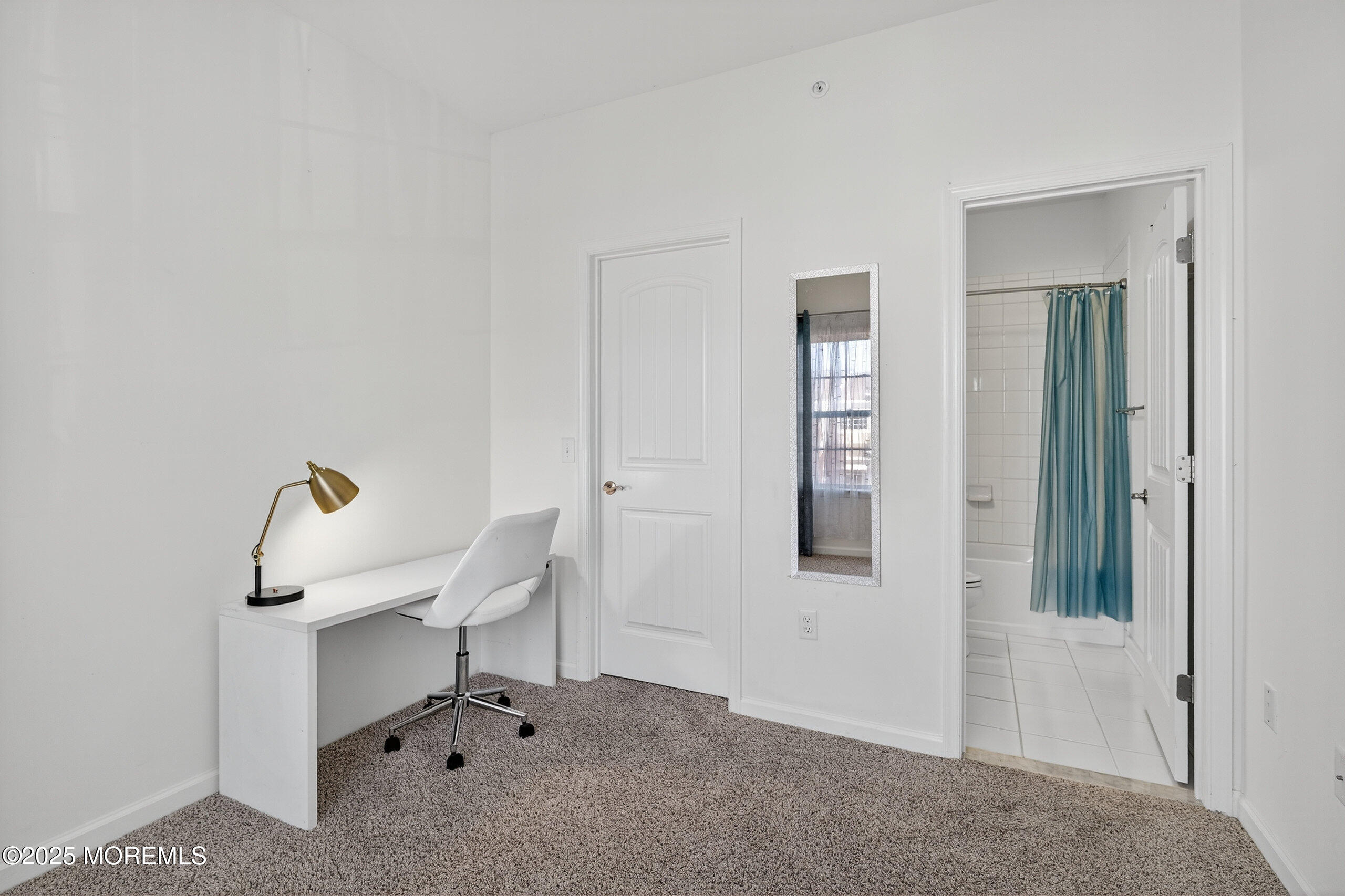 67 Grabowski Drive, Unit 321 Parlin, NJ 08859 - Photo 23 of 38 a view of a hallway with seating area