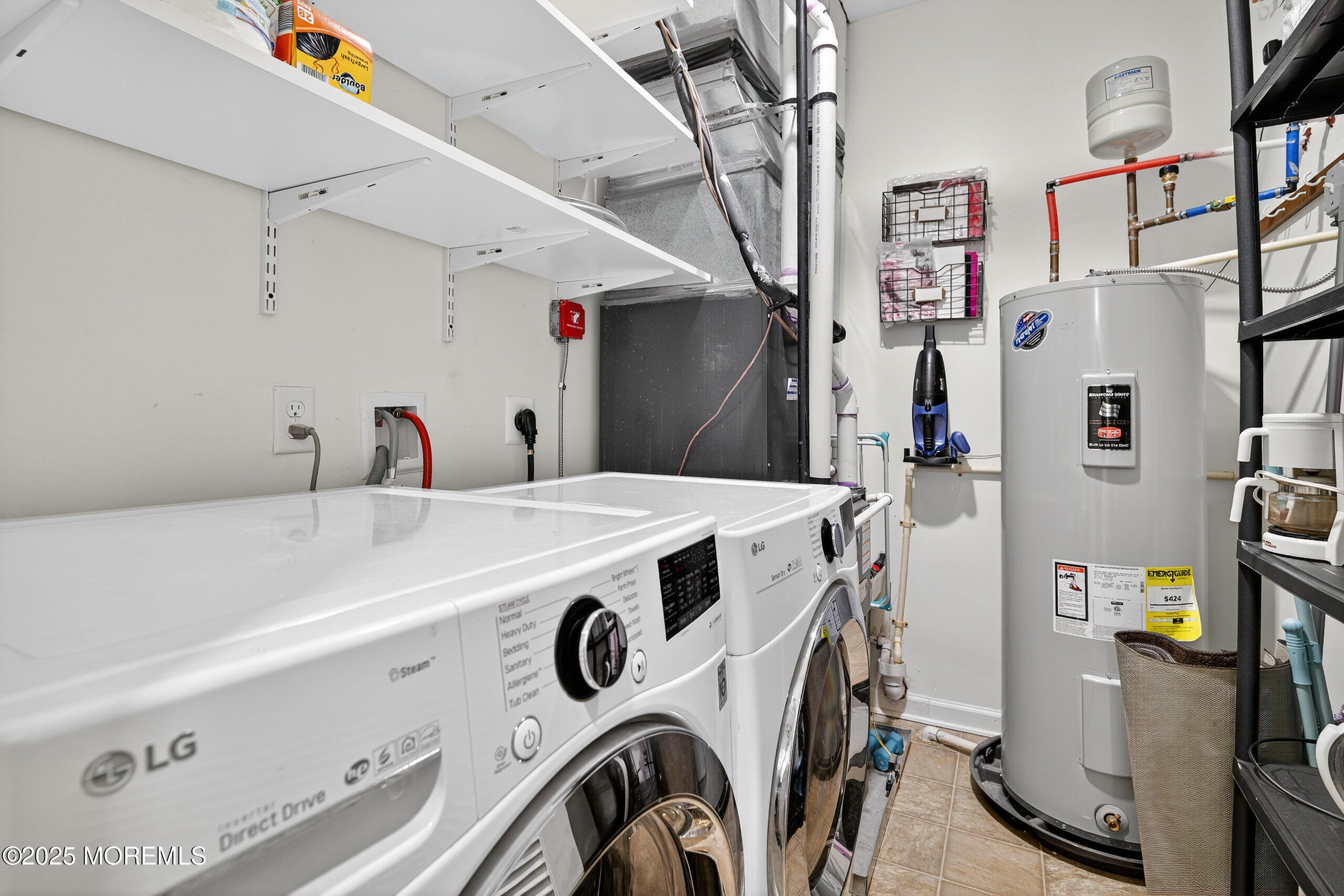 67 Grabowski Drive, Unit 321 Parlin, NJ 08859 - Photo 26 of 38 a utility room with dryer and washer
