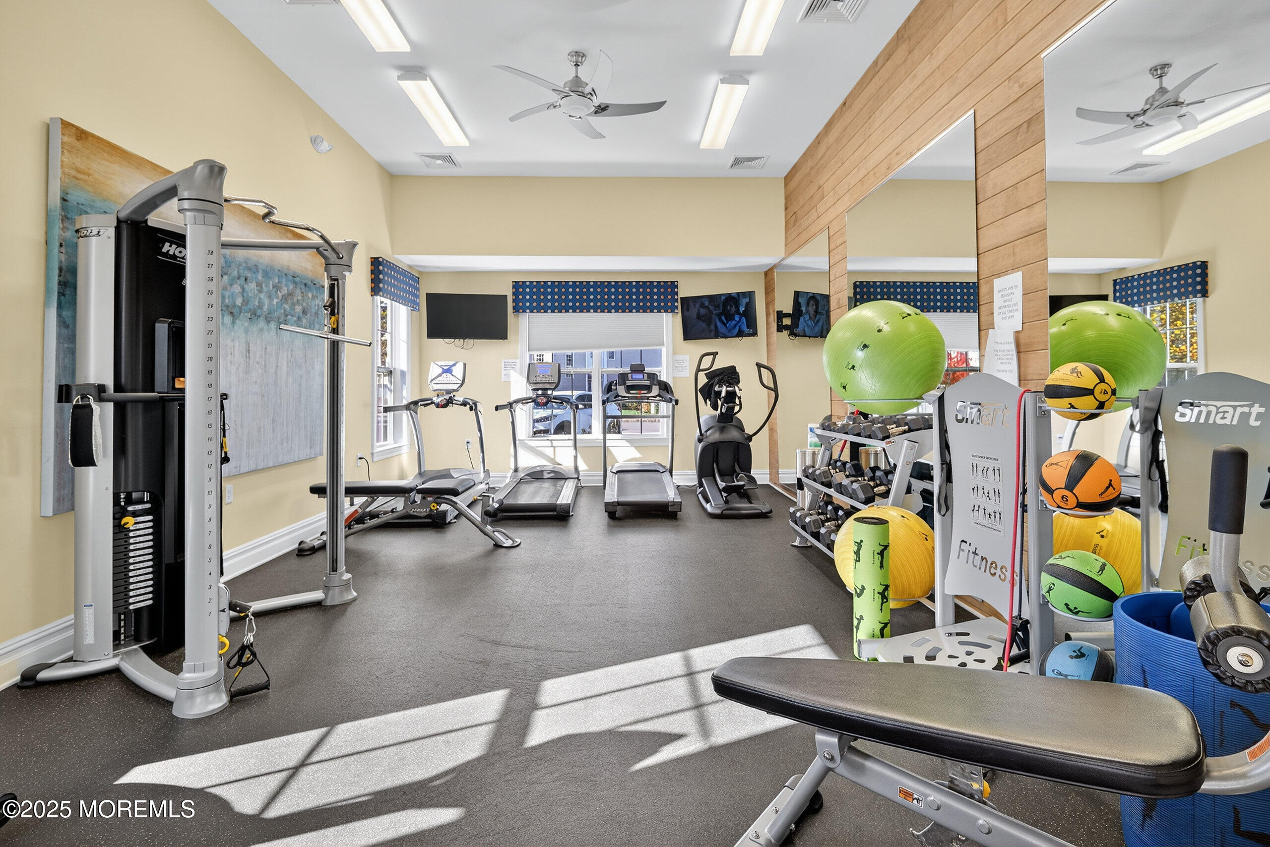 67 Grabowski Drive, Unit 321 Parlin, NJ 08859 - Photo 30 of 38 a view of a room with gym equipment