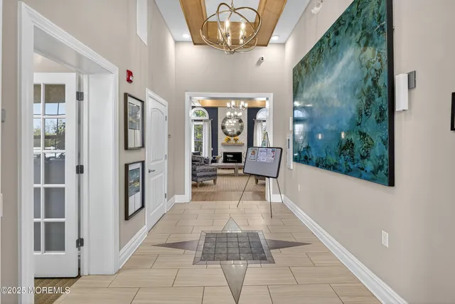 a very nice looking empty room with a large window