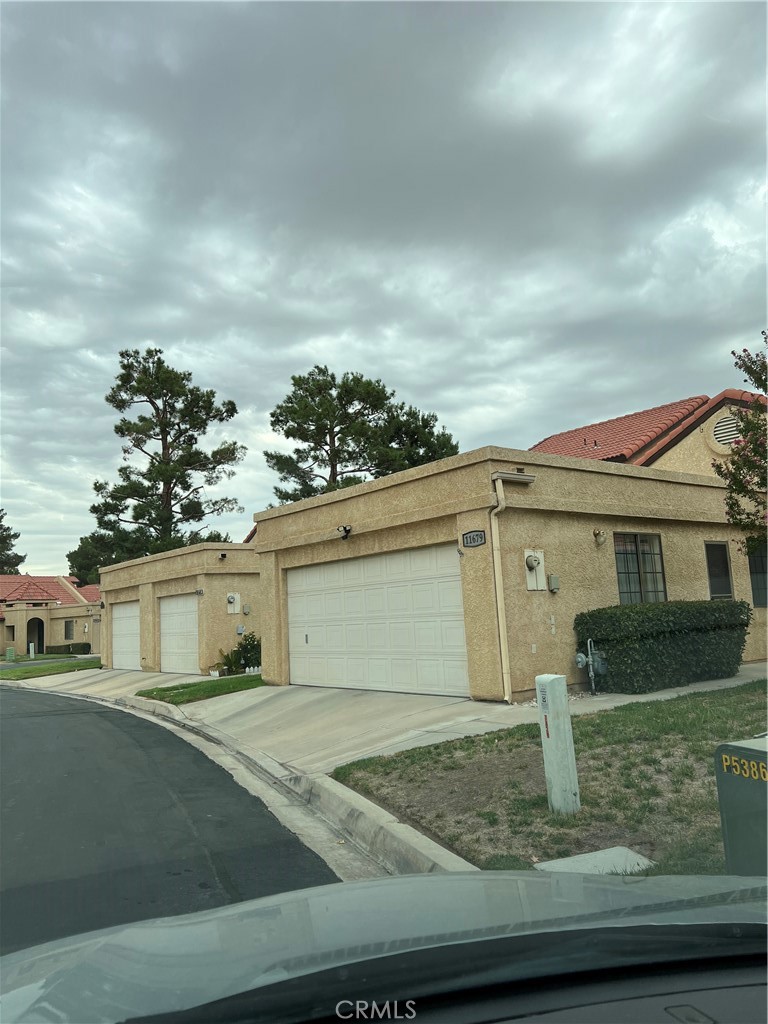 a view of a house with a garage