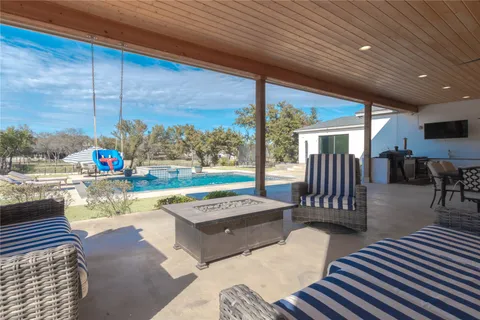 a outdoor dining space with furniture