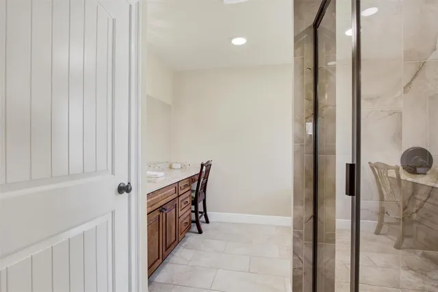 a hallway with cabinets