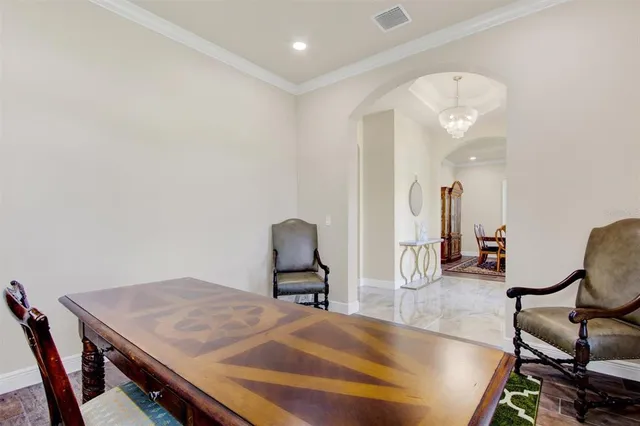 a bedroom with a bed and furniture