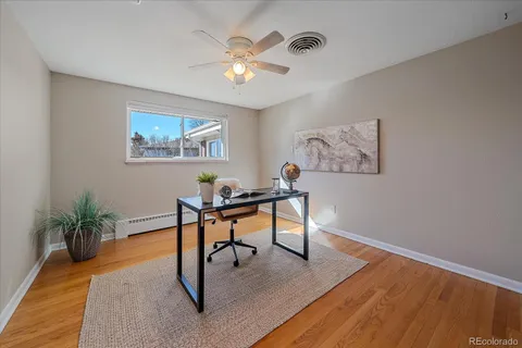a view of a livingroom with furniture and wooden floor