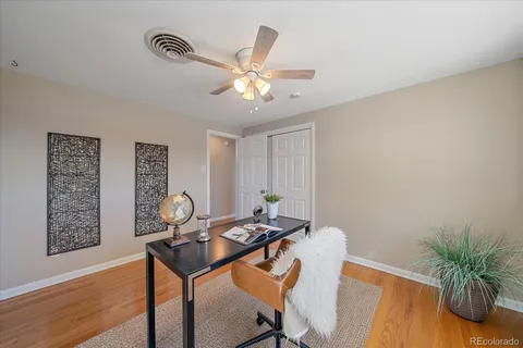 a view of a workspace with furniture