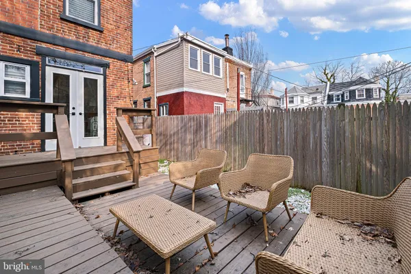 a view of a chairs on the deck