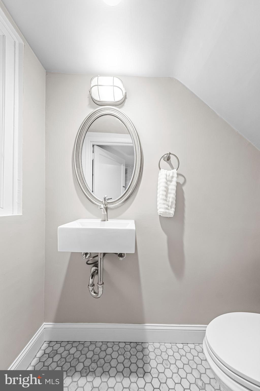 322 Edgehill Road Wayne, PA 19087 - Photo 19 of 42 a bathroom with a toilet and a sink