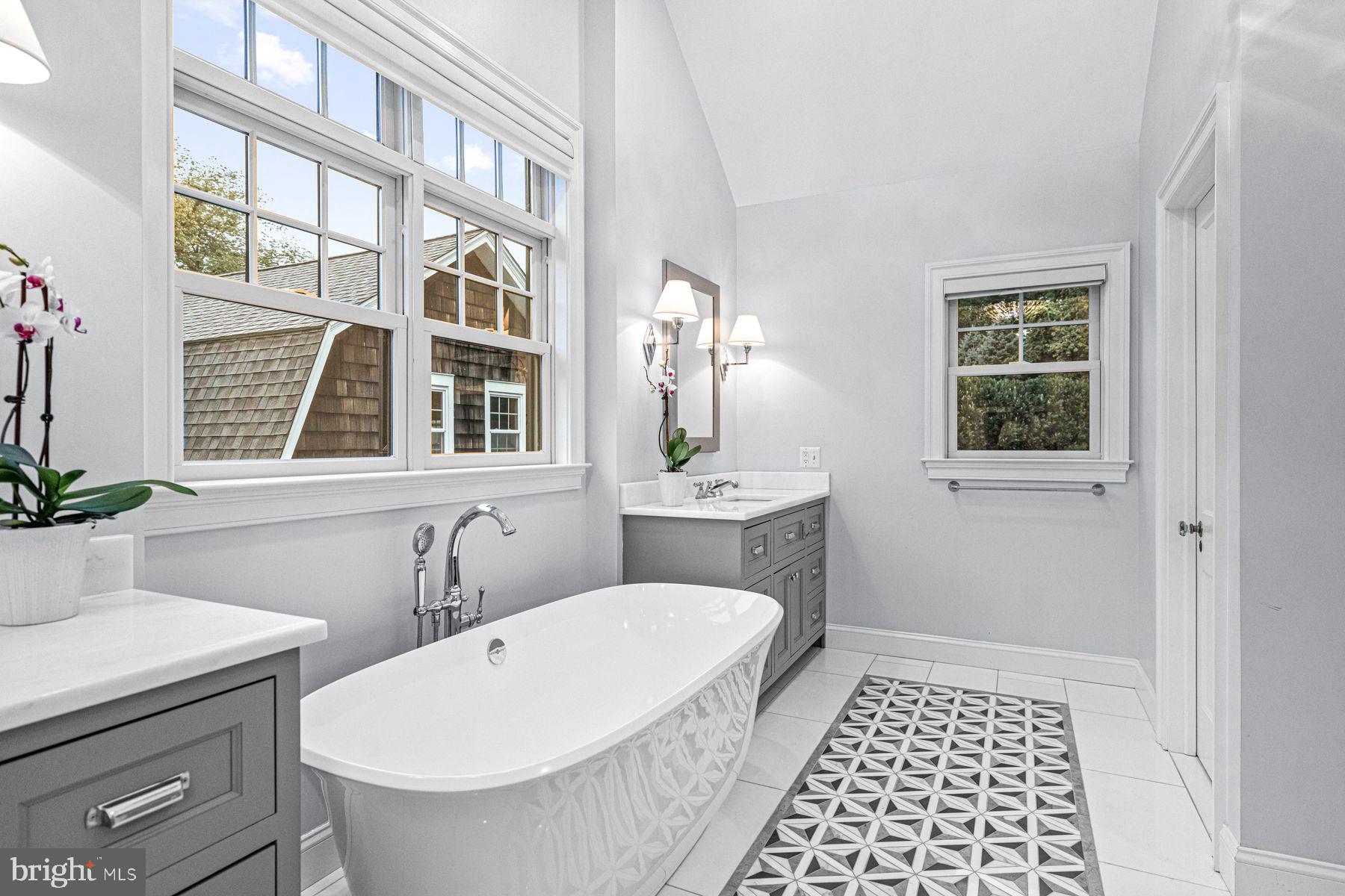 322 Edgehill Road Wayne, PA 19087 - Photo 31 of 42 a bathroom with a sink a toilet and a window