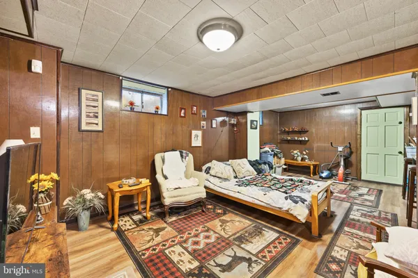 a room with furniture and a large window
