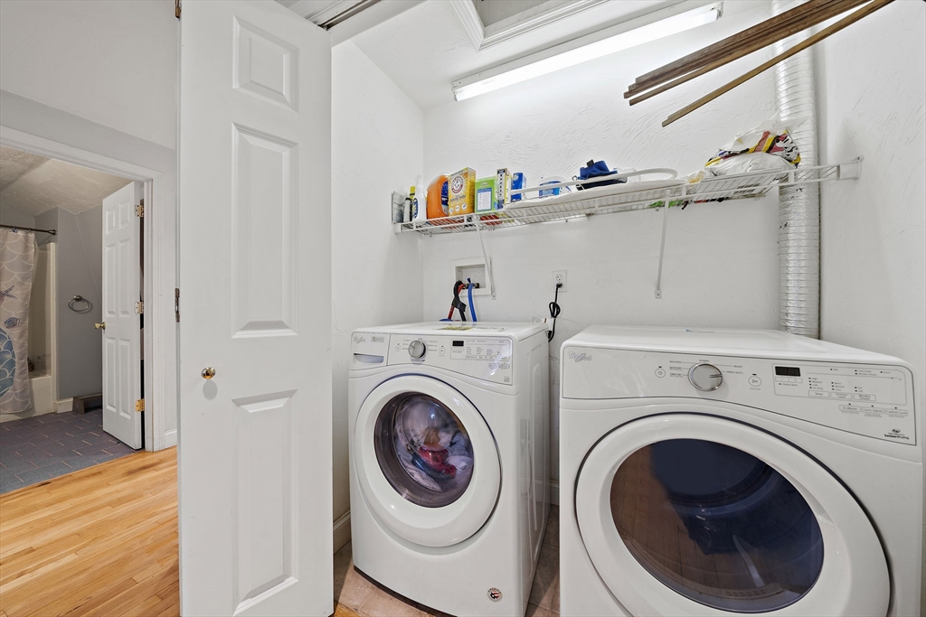 92 Spring Street Quincy, MA 02169 - Photo 22 of 34 a utility room with dryer and washer