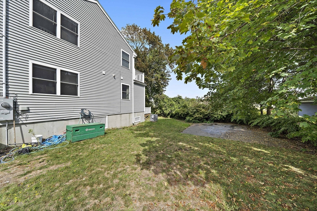 92 Spring Street Quincy, MA 02169 - Photo 27 of 34 a house view with a backyard space