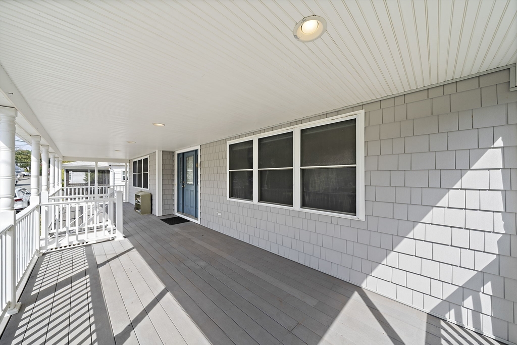 92 Spring Street Quincy, MA 02169 - Photo 28 of 34 a view of a house with wooden floor