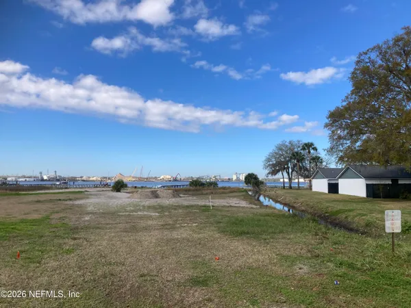 a view of empty room with fireplace