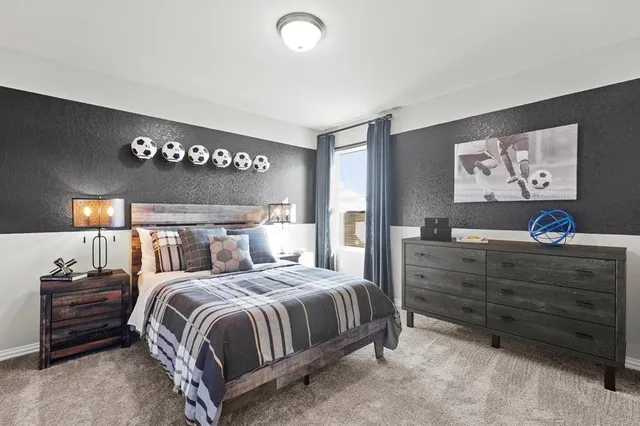 a bedroom with a bed and a walk in closet