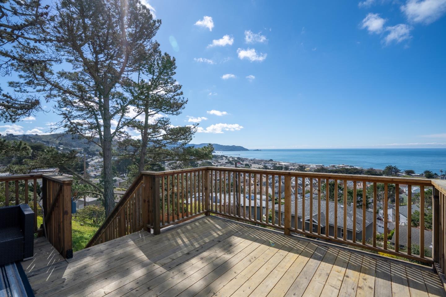 a view of wooden balcony with outdoor space