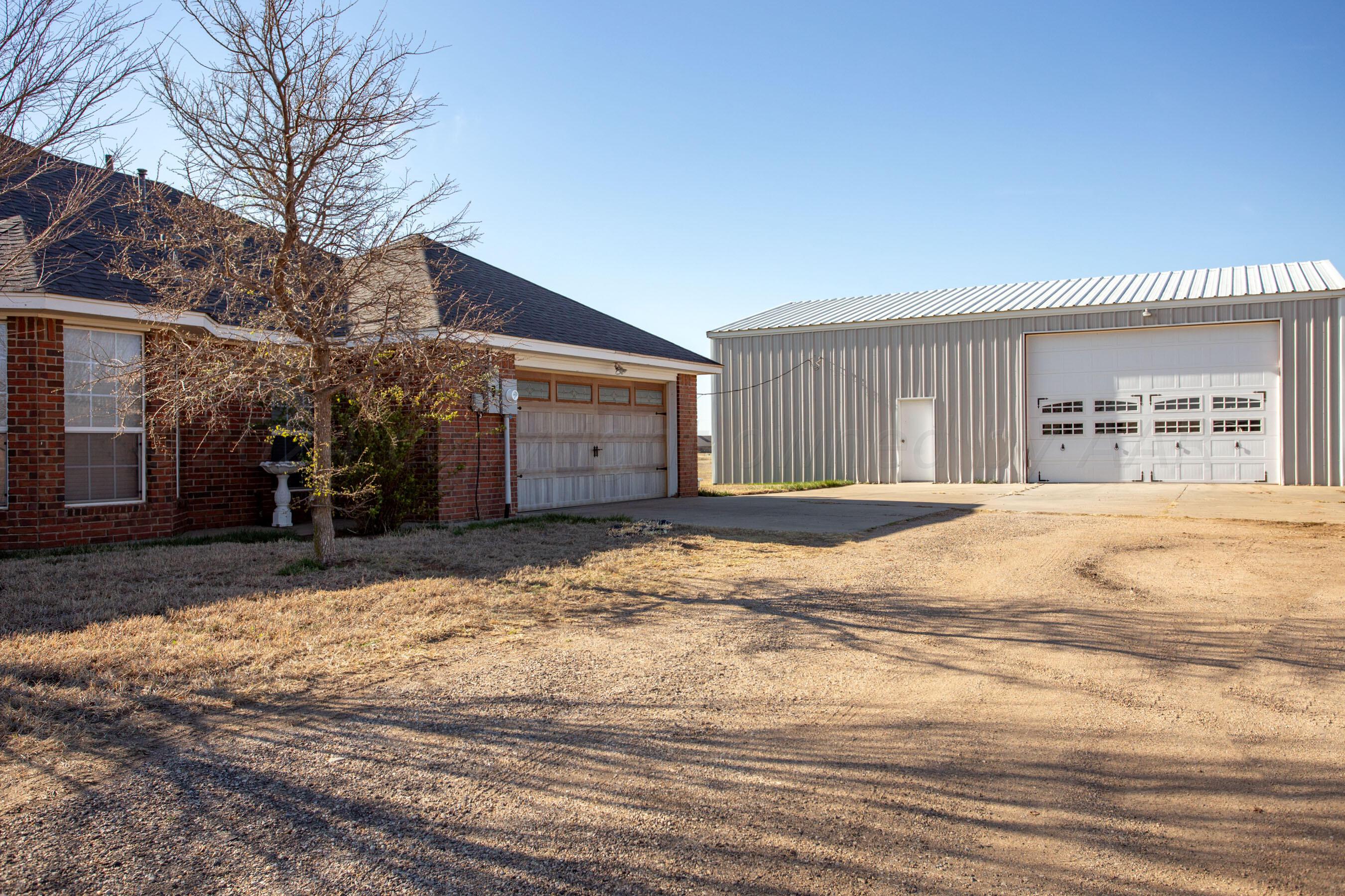 19701 Prairie Wind Road Bushland, TX 79124 - Photo 2 of 34 Front of home with Shop