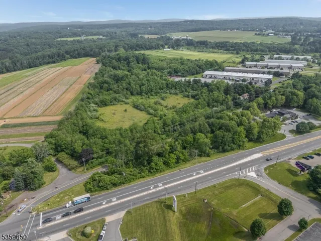 a view of a pool with a yard