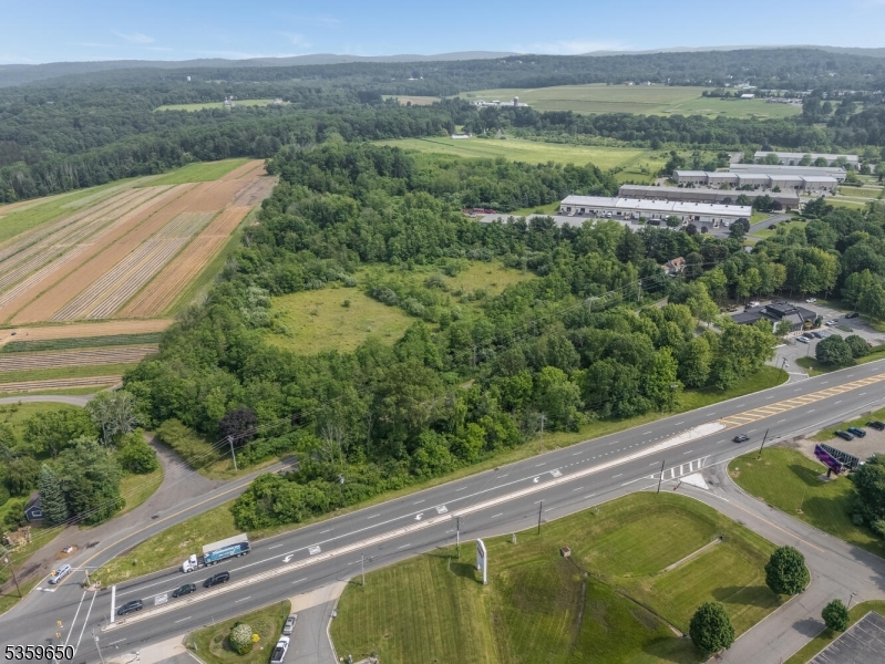 398 Highway 46 Hackettstown, NJ 07840 - Photo 3 of 6 a view of a pool with a yard