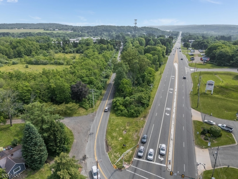 398 Highway 46 Hackettstown, NJ 07840 - Photo 6 of 6 an aerial view of a house with a yard and balcony