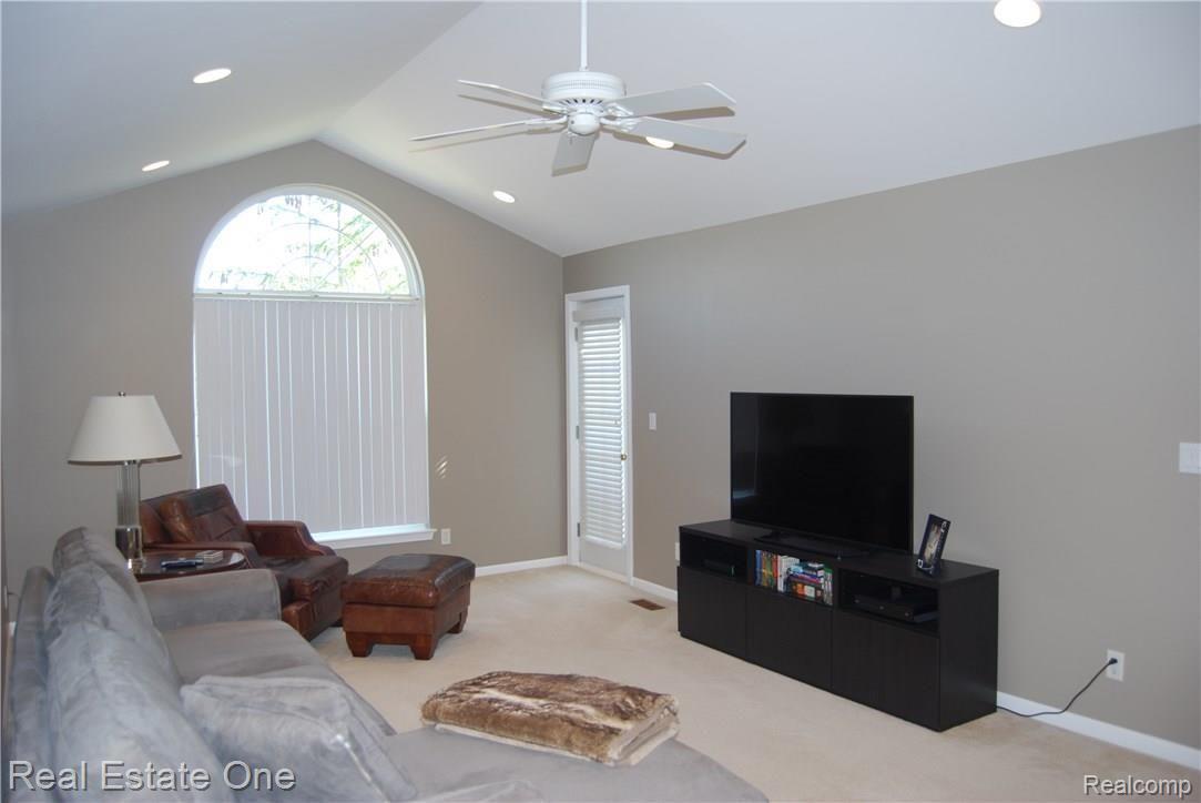 3540 Tremonte Circle, Unit 138 Rochester, MI 48306 - Photo 3 of 19 Cathedral Ceiling Great Room leads to Balcony