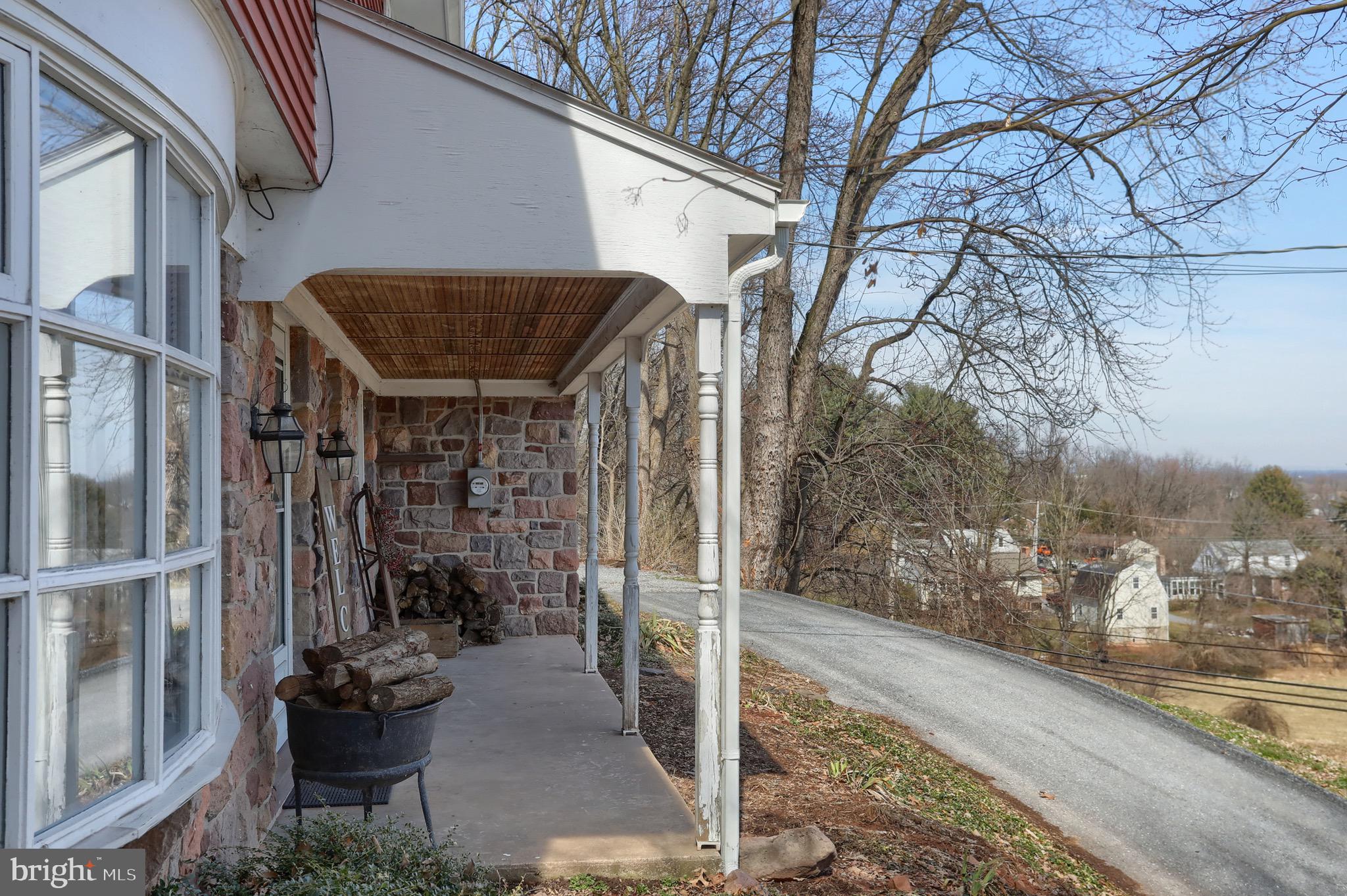 Front porch looking over farm and valley
