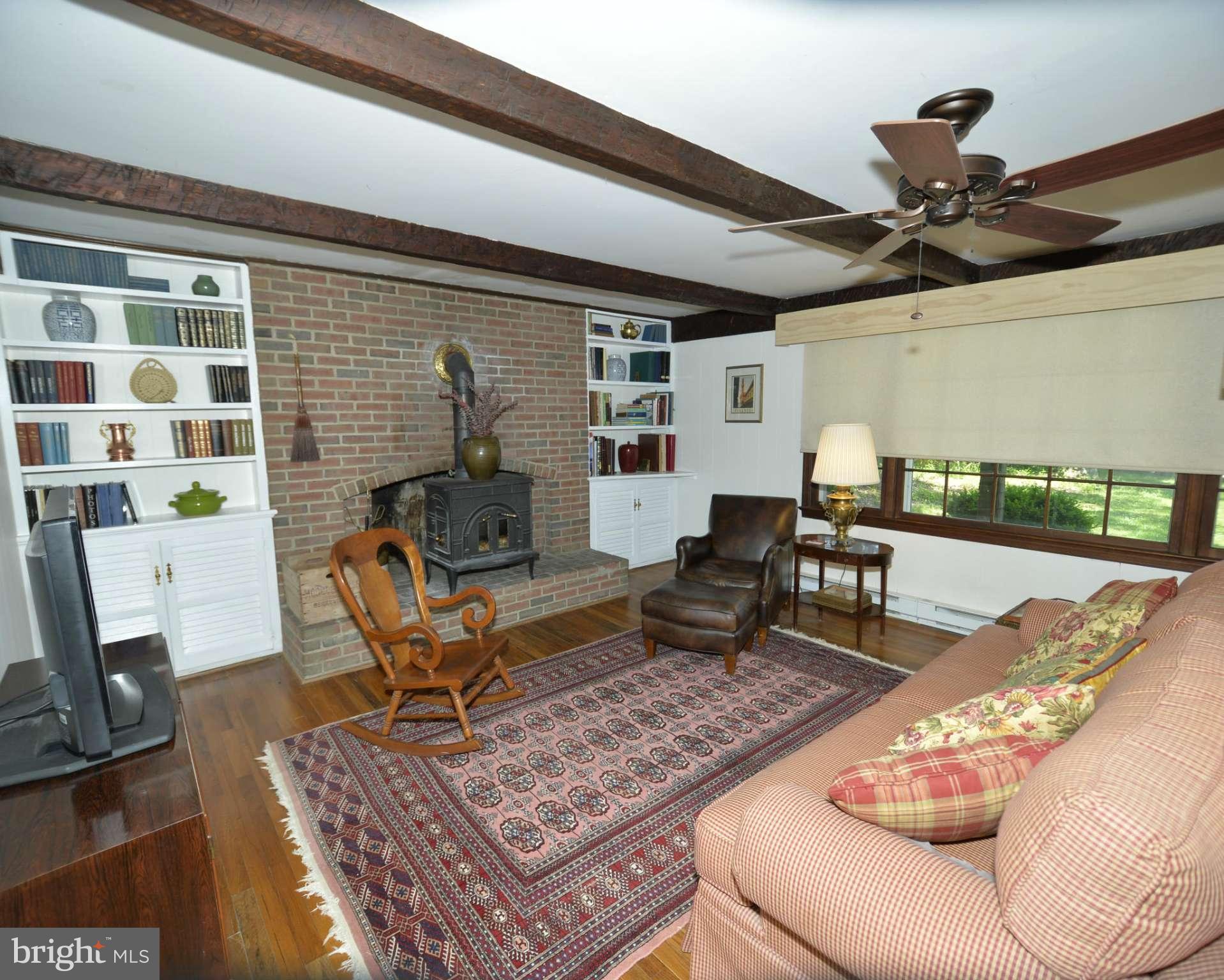6446 Howellsville Road Front Royal, VA 22630 - Photo 15 of 30 a living room with furniture and a rug