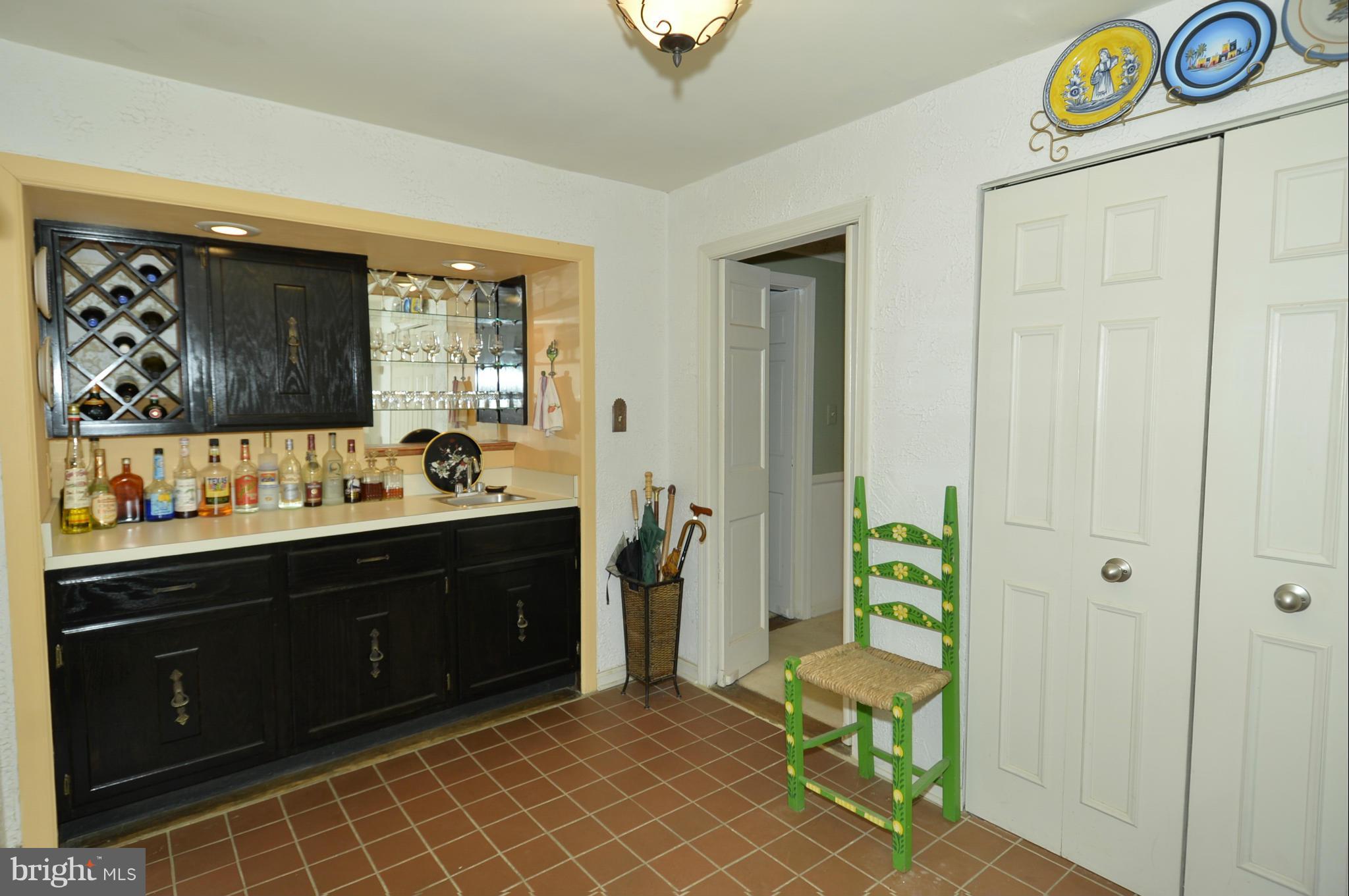 6446 Howellsville Road Front Royal, VA 22630 - Photo 19 of 30 a bathroom with a sink a mirror and a bathtub