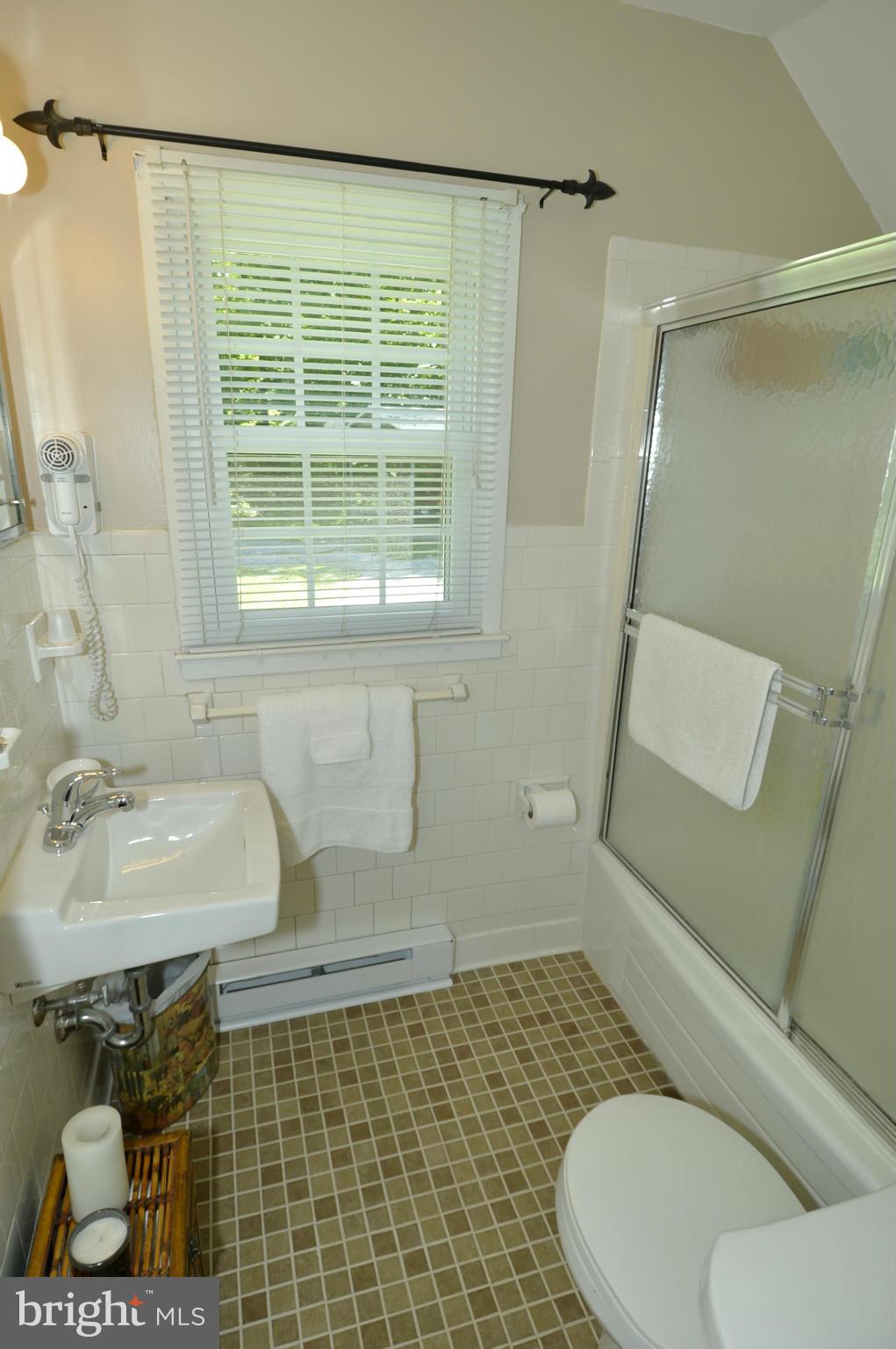 6446 Howellsville Road Front Royal, VA 22630 - Photo 24 of 30 a bathroom with a toilet and a sink