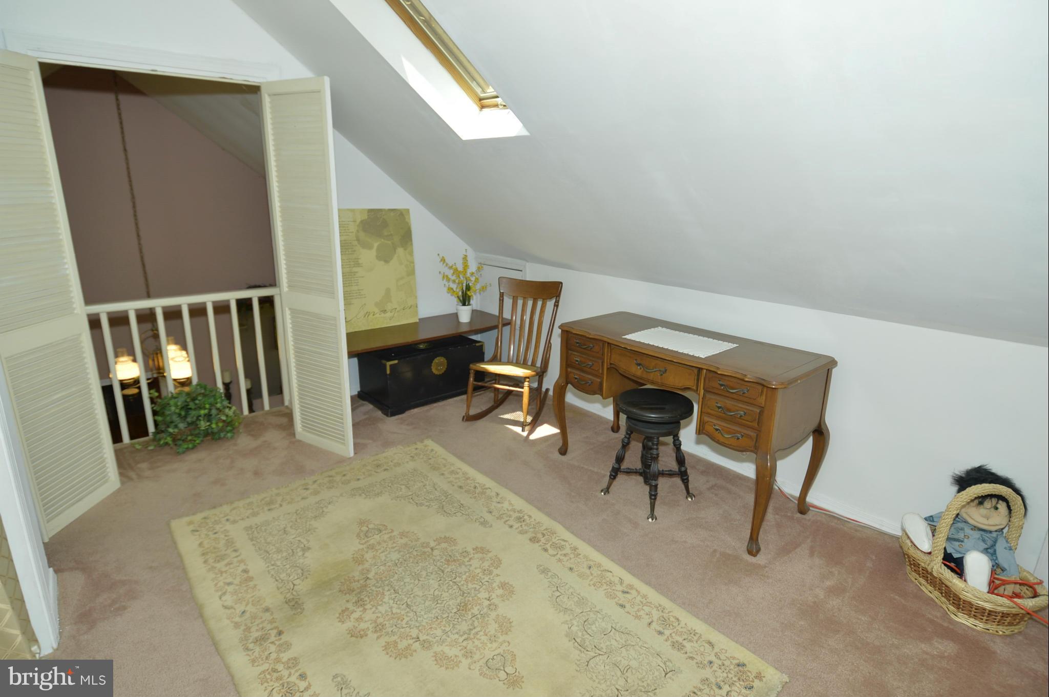 6446 Howellsville Road Front Royal, VA 22630 - Photo 30 of 30 a view of a livingroom with furniture and stairs